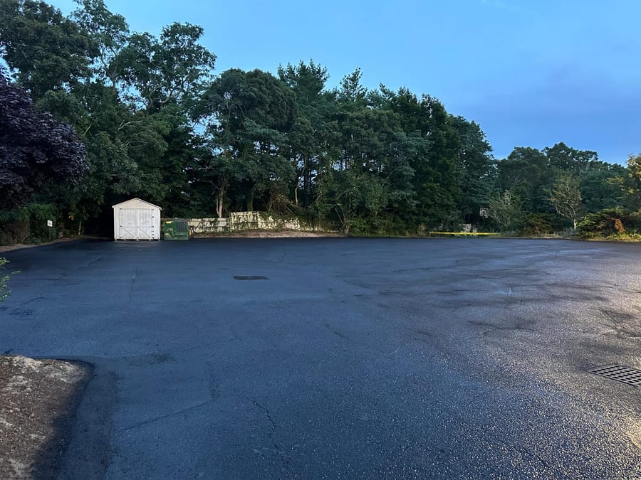 Large commercial lot with a fresh dark sealcoated surface